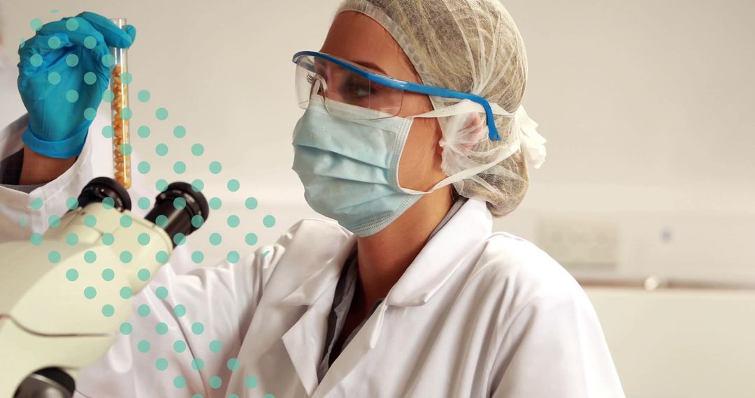 Scientist Analyzing Sample Beside Microscope in Laboratory