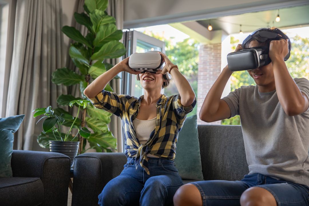 Diverse Family Enjoying Virtual Reality Technology at Home