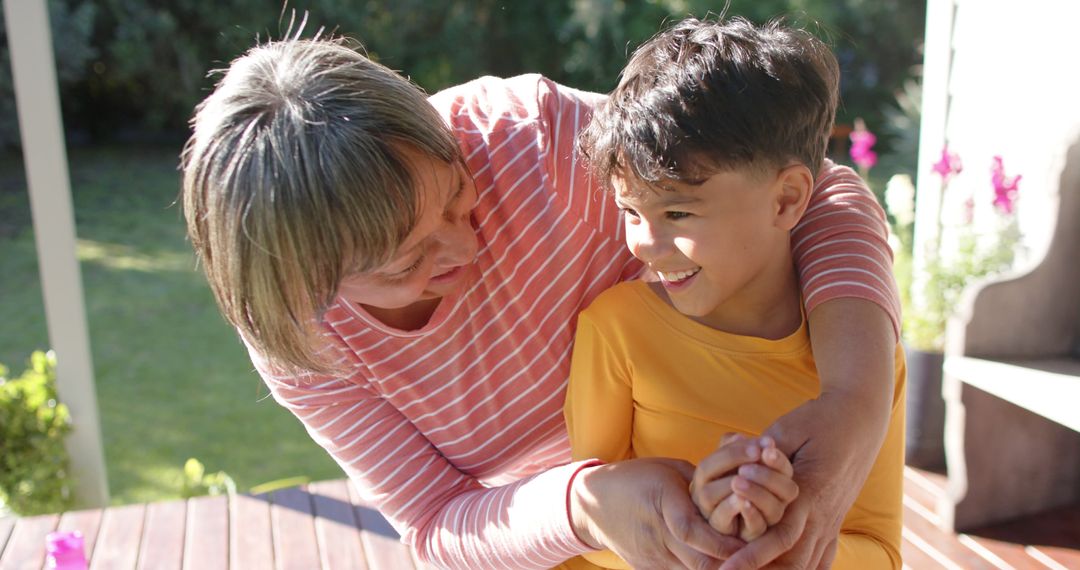 Loving Grandmother and Grandson Bonding in Backyard - Free Images, Stock Photos and Pictures on Pikwizard.com