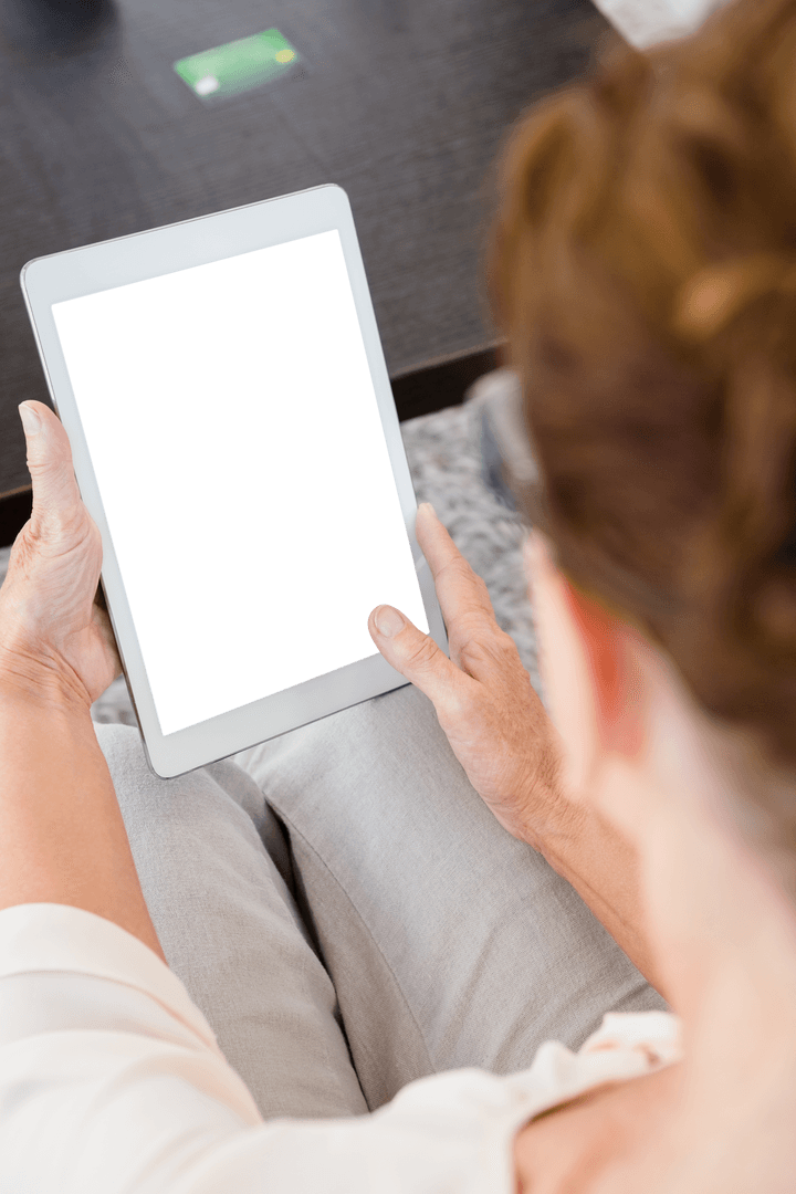 Woman Using Transparent Tablet in Modern Workspace