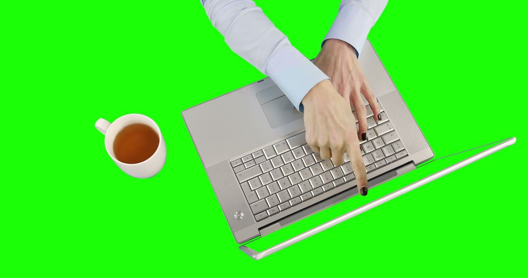 Businesswoman Using Laptop With Coffee On Bright Green Background - Free Images, Stock Photos and Pictures on Pikwizard.com