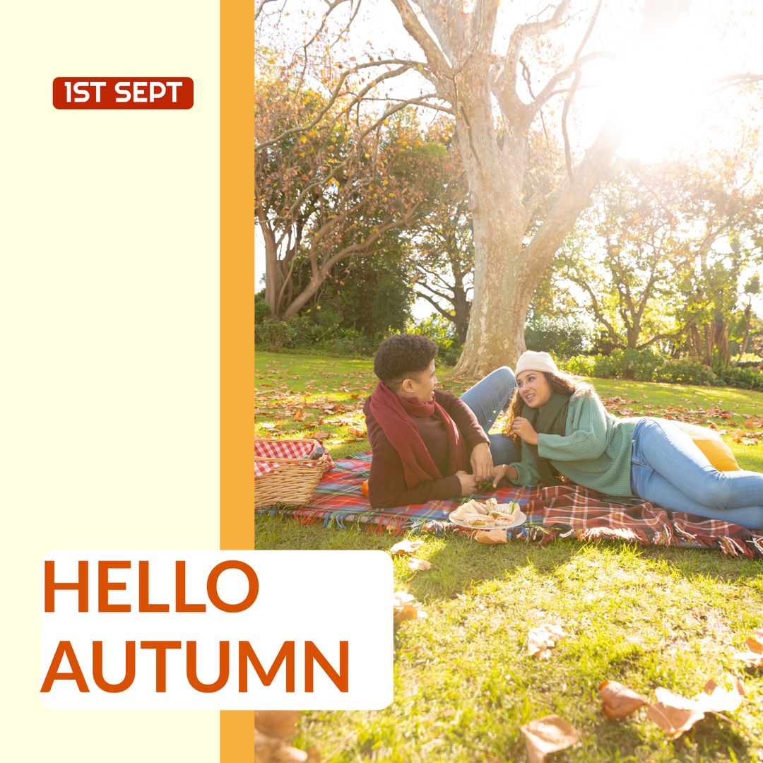 Happy Diverse Couple Enjoying Autumn Picnic in Park