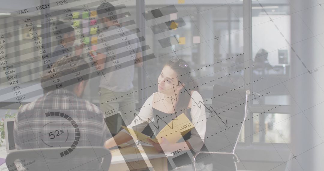 Business Team Analyzing Data with Diagrams Overlay