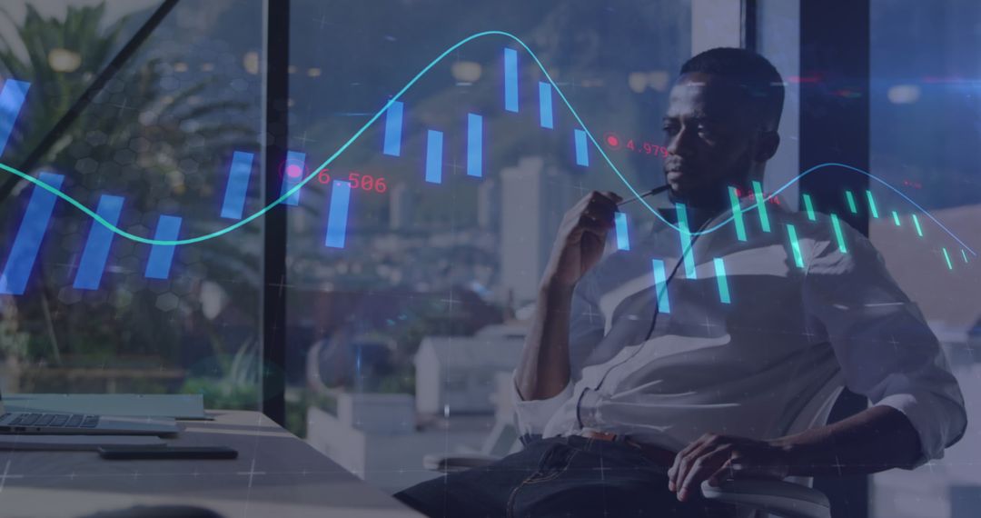 Businessman Analyzing Market Data with Digital Graph Overlay