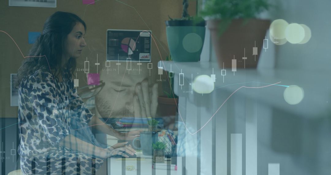 Focused Woman Analyzing Digital Data In Modern Workspace