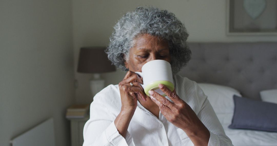 Senior woman enjoying morning coffee at home - Free Images, Stock Photos and Pictures on Pikwizard.com