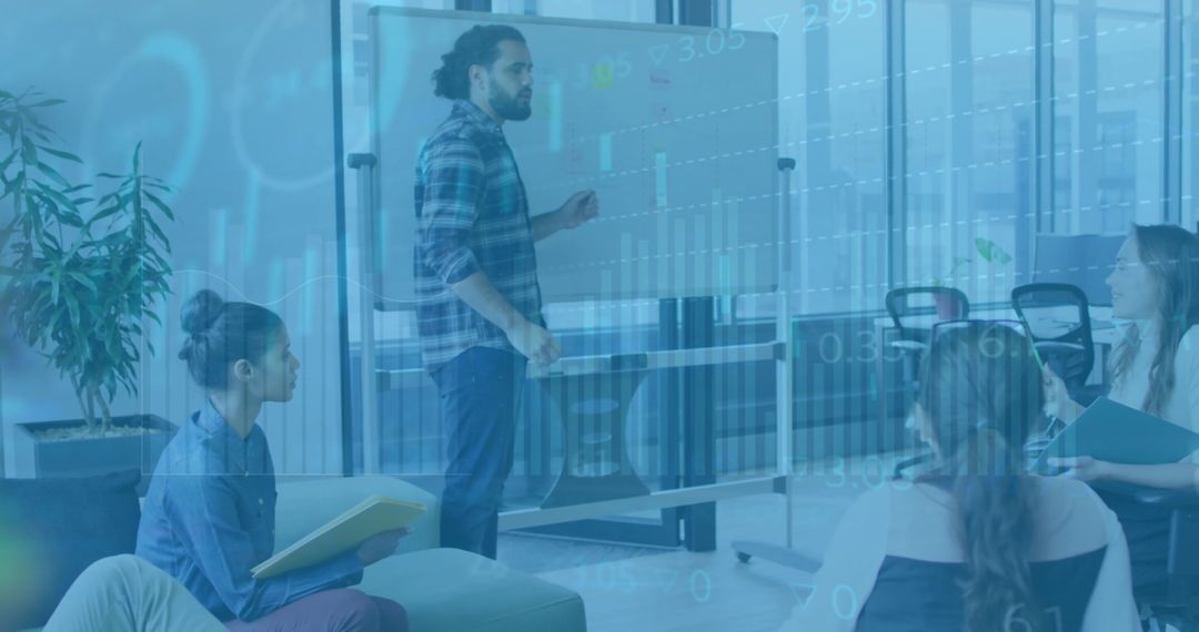 Diverse Team Analyzing Financial Data in Modern Office Meeting