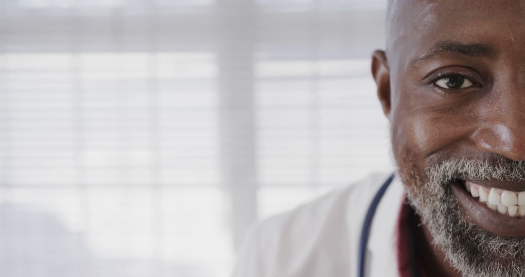 Close-Up of Smiling Male Professional Wearing White Coat - Free Images, Stock Photos and Pictures on Pikwizard.com