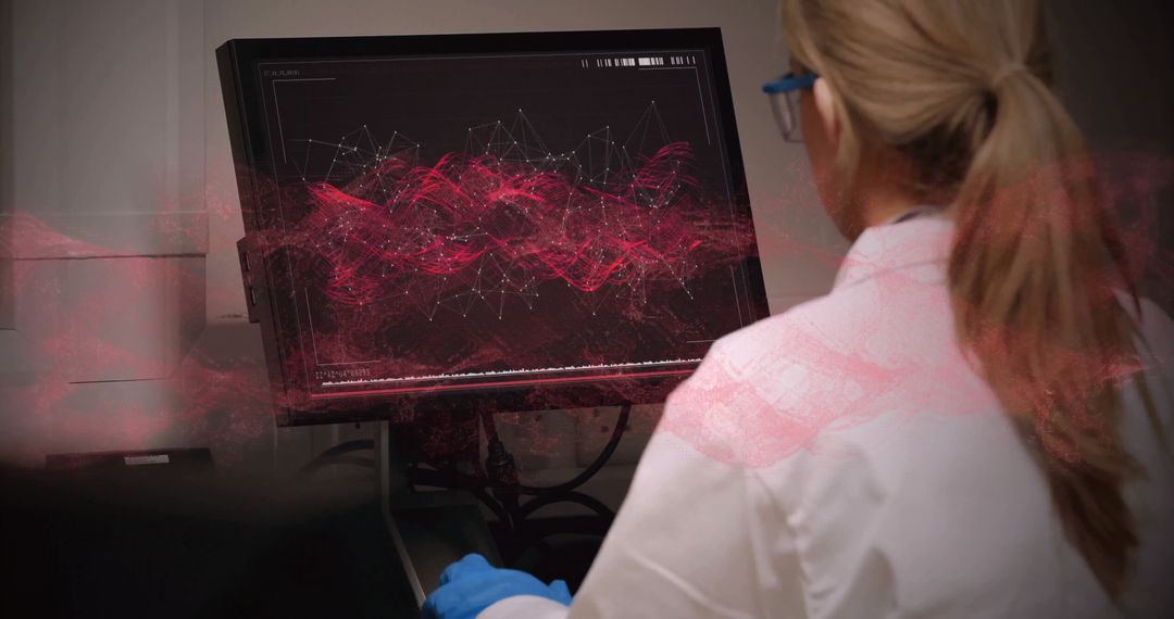 Scientist Analyzing Computational Data in Modern Laboratory - Free Images, Stock Photos and Pictures on Pikwizard.com