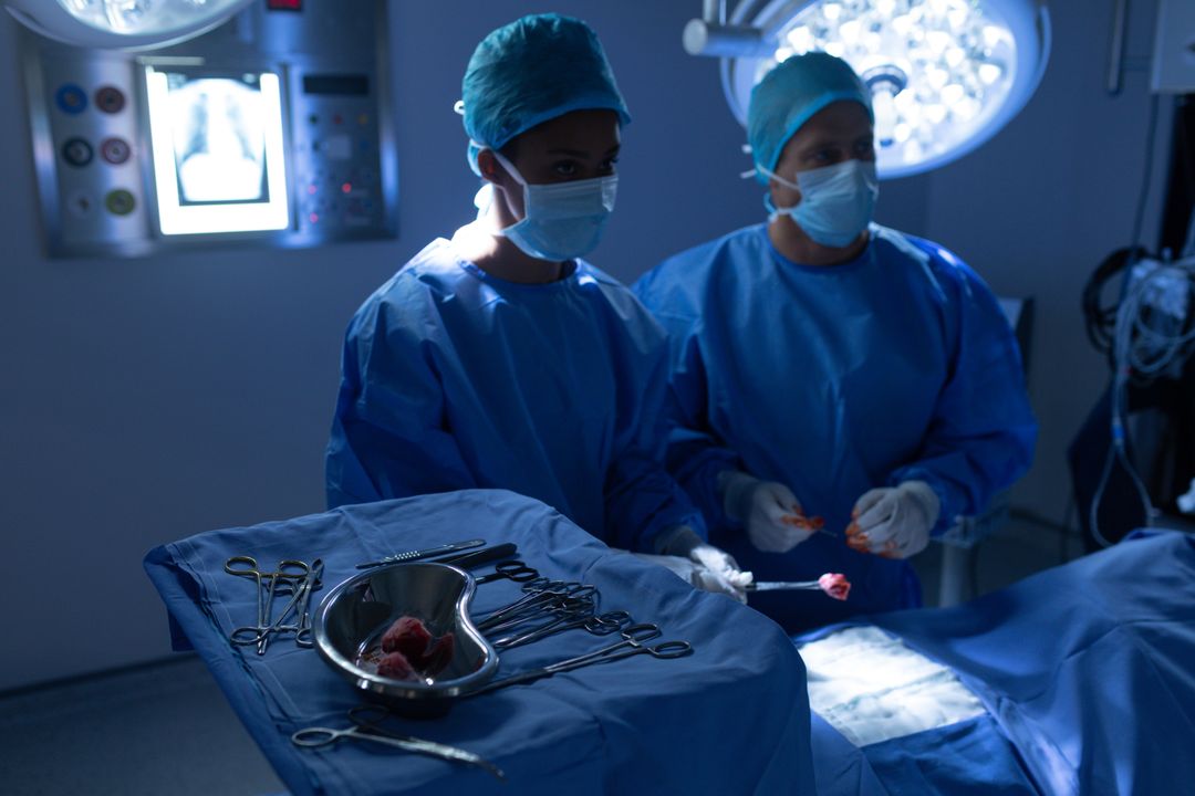 Surgeons performing operation in operation theater - Free Images, Stock Photos and Pictures on Pikwizard.com