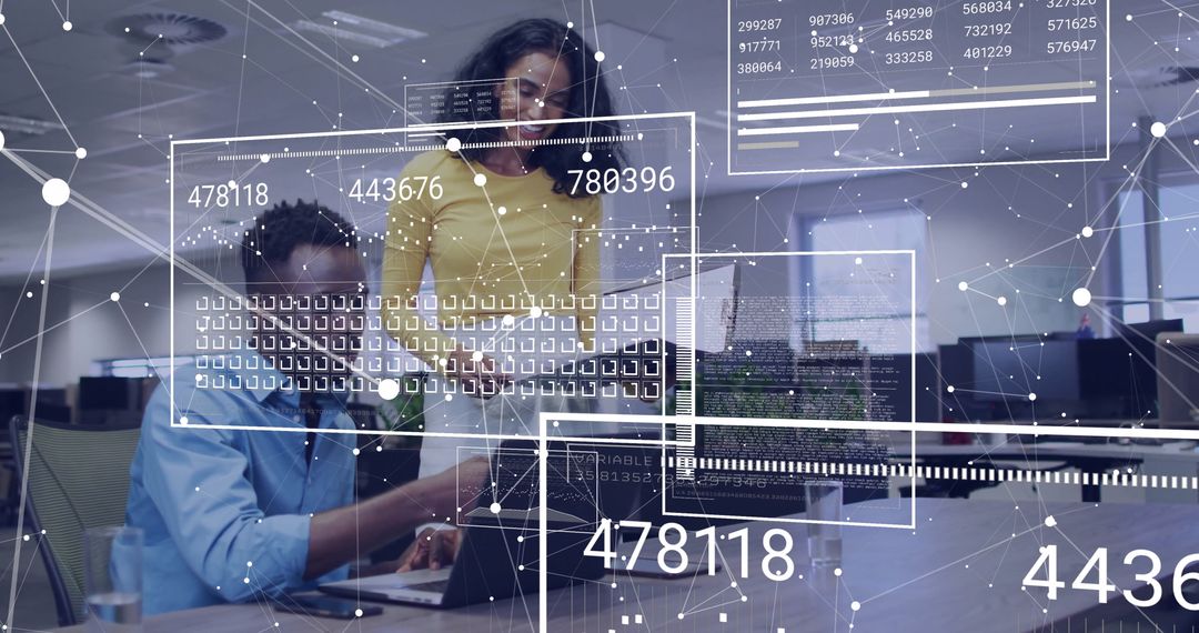 IT Professionals Analyzing Network Data in Modern Office Environment