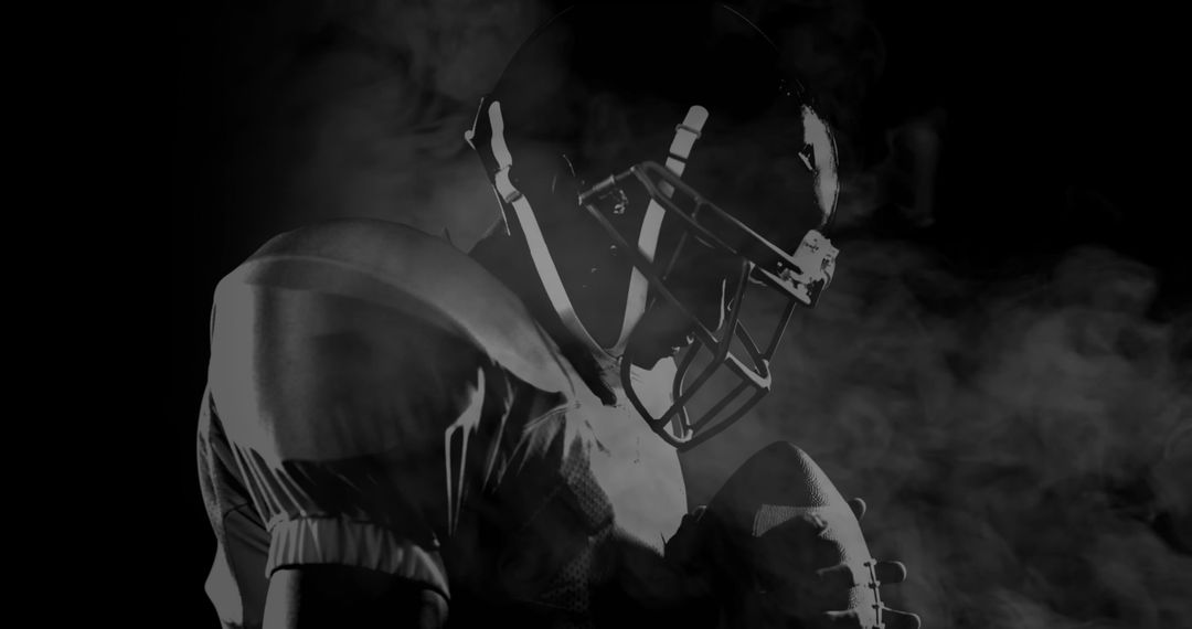 American Football Player in Determined Pose with Smoke