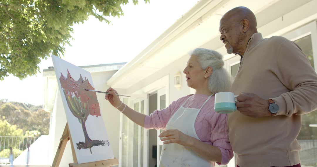 Senior Couple Enjoying Outdoor Painting Together - Free Images, Stock Photos and Pictures on Pikwizard.com