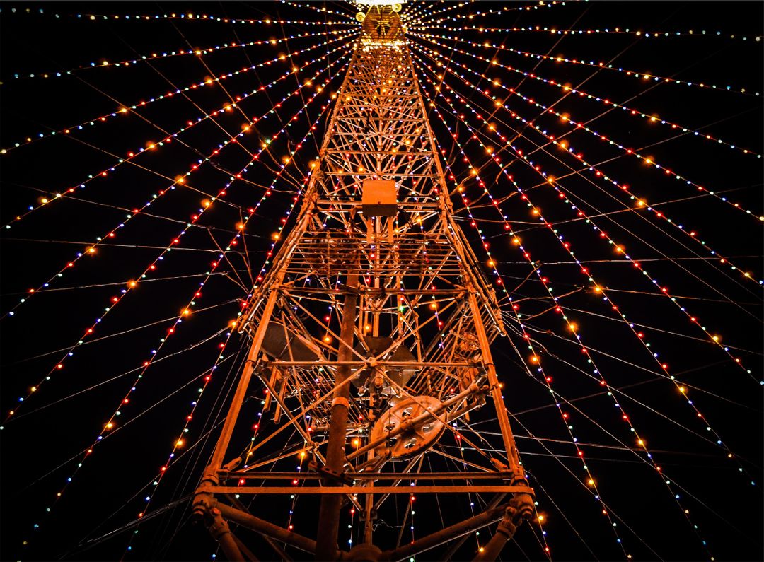 Looking Up at Vibrantly Lit Ferris Wheel at Night - Free Images, Stock Photos and Pictures on Pikwizard.com