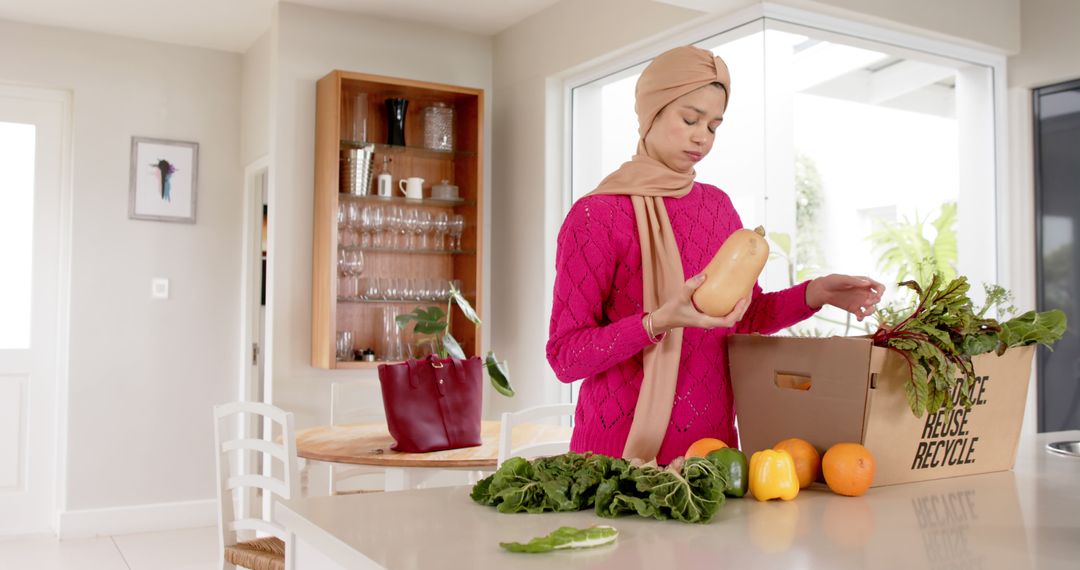 Woman Unpacking Groceries in Modern Kitchen at Home - Free Images, Stock Photos and Pictures on Pikwizard.com