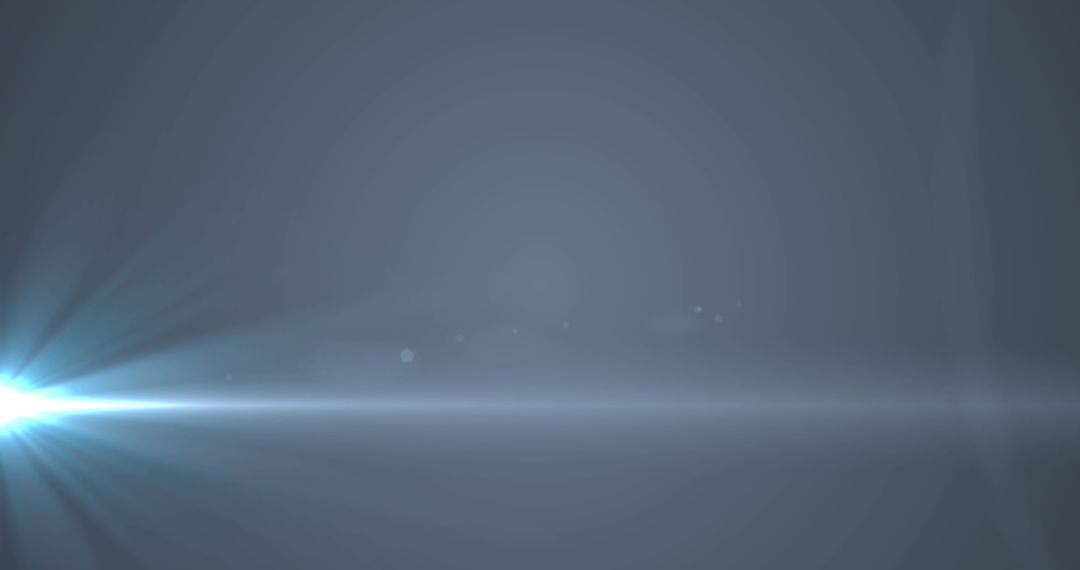 Blue Beam of Light on Grey Background with Lens Flare