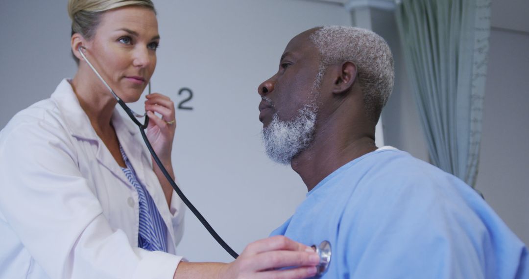 Doctor Using Stethoscope on Senior Patient During Checkup - Free Images, Stock Photos and Pictures on Pikwizard.com