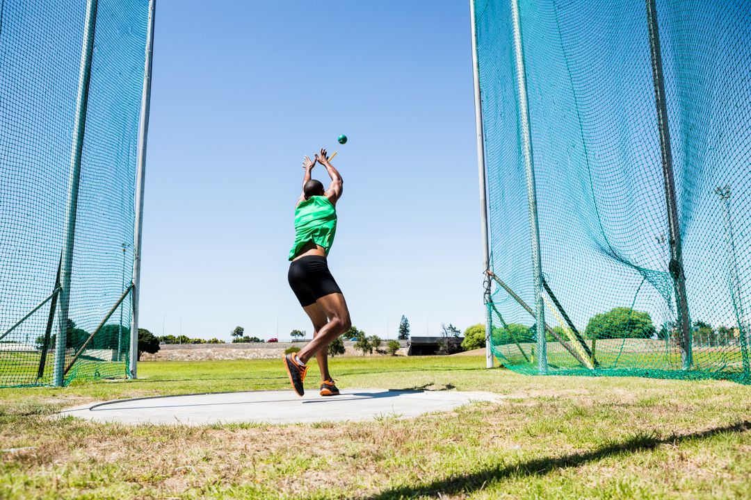 Athlete performing a hammer throw - Free Images, Stock Photos and Pictures on Pikwizard.com