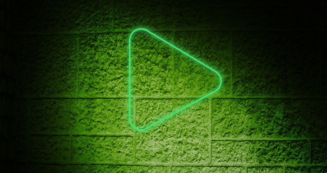 Green Neon Play Button Sign on a Textured Brick Wall - Free Images, Stock Photos and Pictures on Pikwizard.com