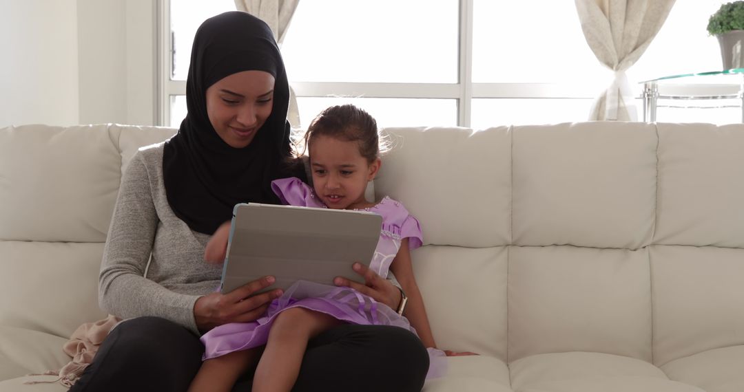 Mother and Daughter Sharing Digital Learning at Home