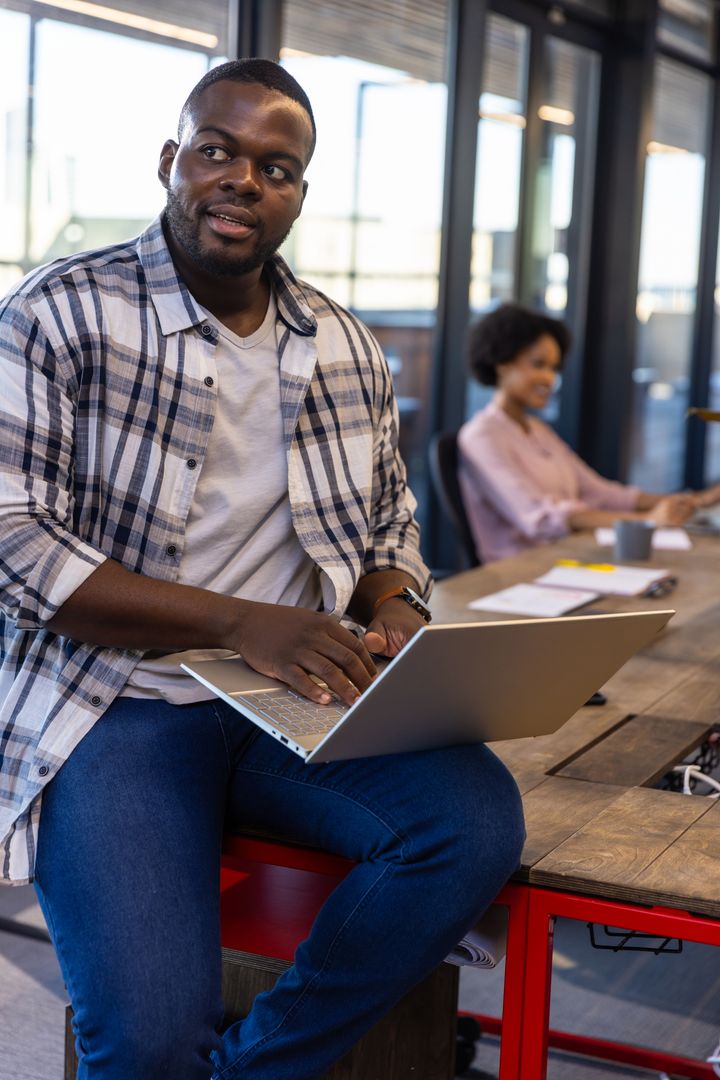 African American Professionals Collaborating in Modern Office Setting