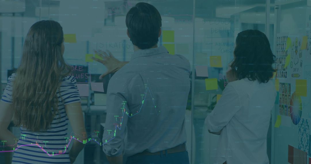 Brainstorming Team in Modern Office with Sticky Notes