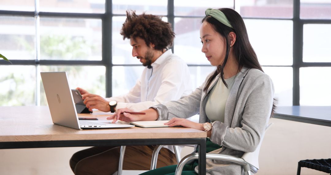 Diverse Colleagues Collaborating in Professional Workspace