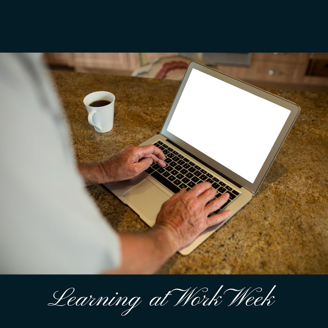 Caucasian Man Using Laptop: Learning at Work Week Concept