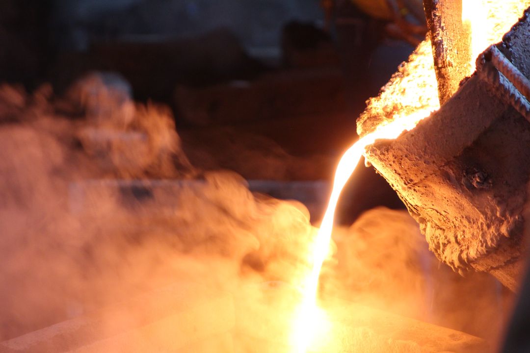 Molten Metal Being Poured in a Foundry - Free Images, Stock Photos and Pictures on Pikwizard.com