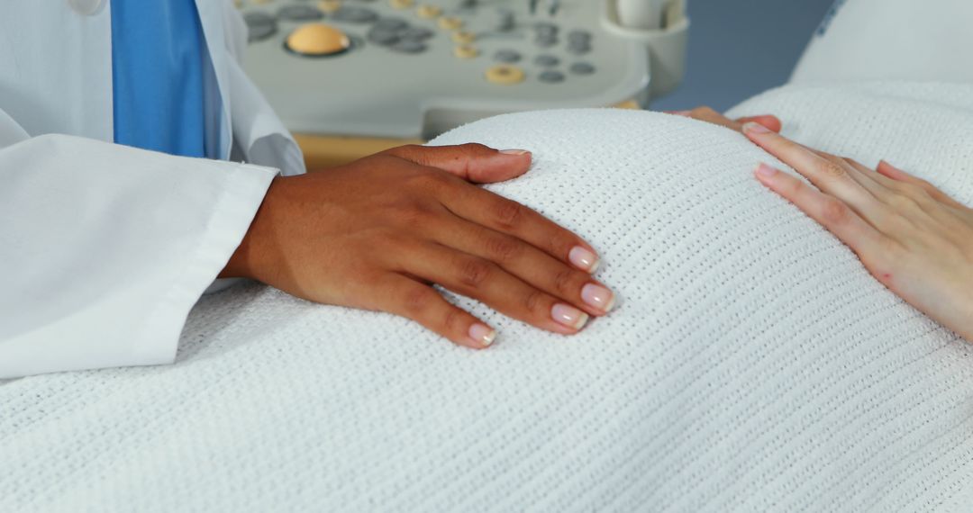 Doctor Checking Pregnant Woman During Ultrasound Exam - Free Images, Stock Photos and Pictures on Pikwizard.com