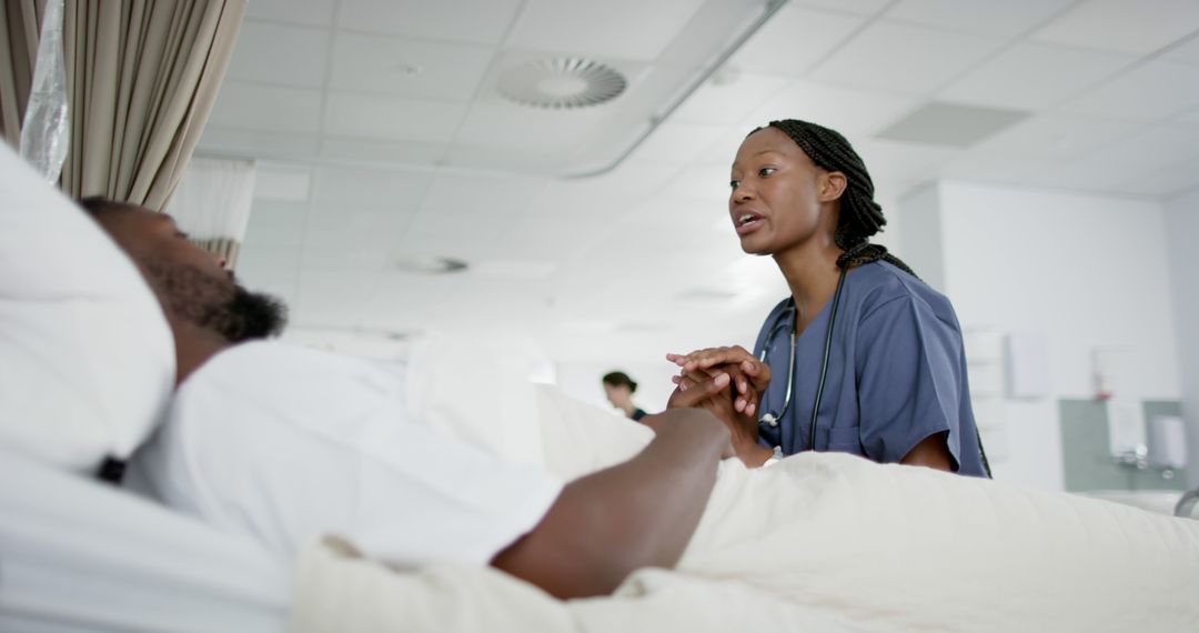 Dedicated Nurse Interacts with Hospitalized Patient in Modern Ward - Free Images, Stock Photos and Pictures on Pikwizard.com