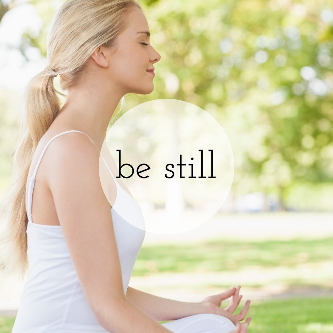 Serene Woman Meditating in Tranquil Outdoor Scene