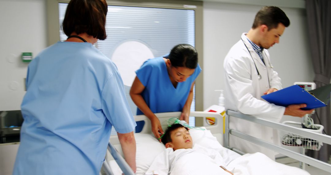 Healthcare Workers and Doctor Attending to Unconscious Child in Hospital - Free Images, Stock Photos and Pictures on Pikwizard.com