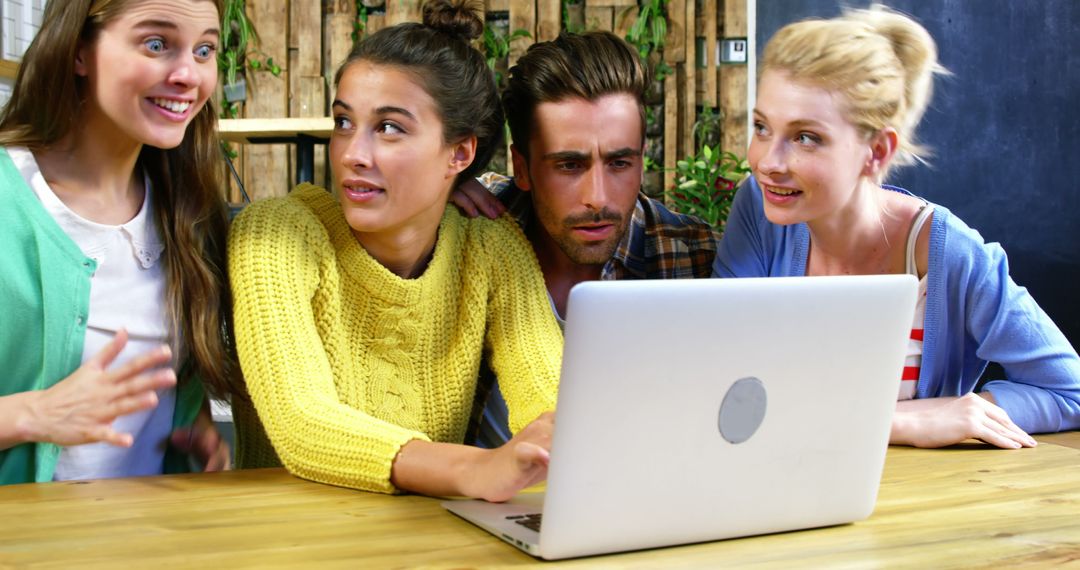 Diverse Group Enjoying Coffee and Technology Together