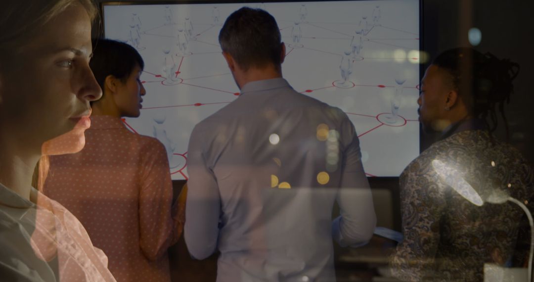 Diverse Team Discussing Digital Interface Solutions in Office