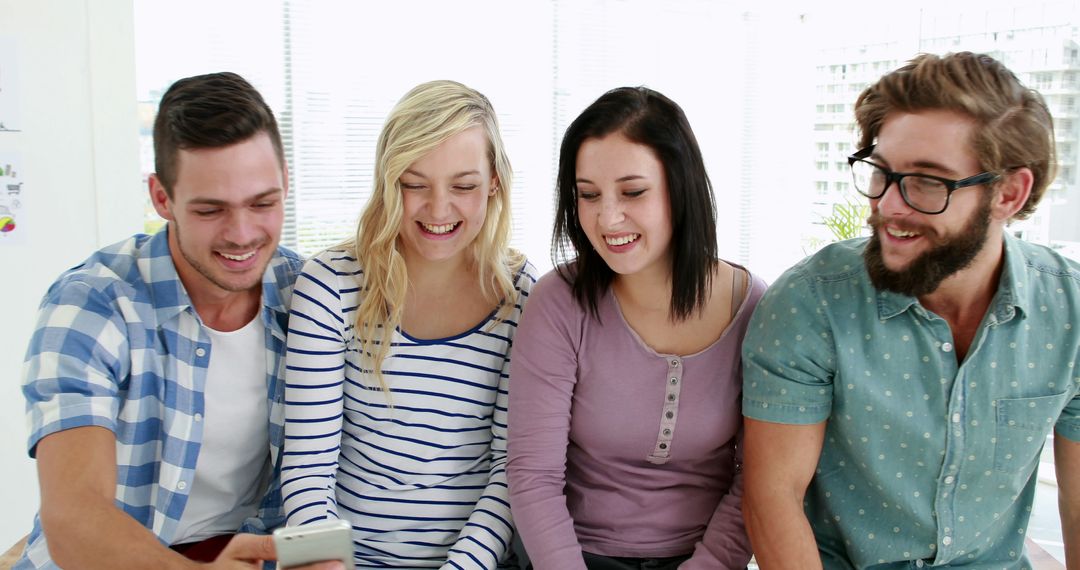 Group of Friends Enjoying Smartphone Fun Together