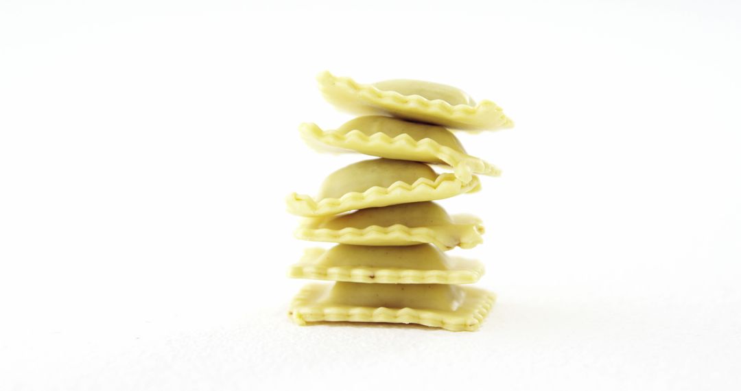 Stack of Raw Ravioli Pasta on White Background - Free Images, Stock Photos and Pictures on Pikwizard.com