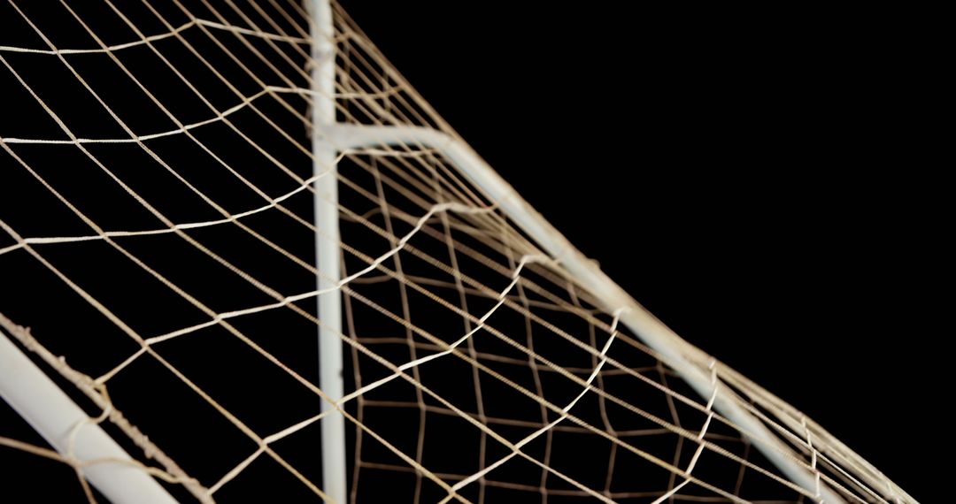 Close-up of Soccer Goal Net Against Black Background - Free Images, Stock Photos and Pictures on Pikwizard.com