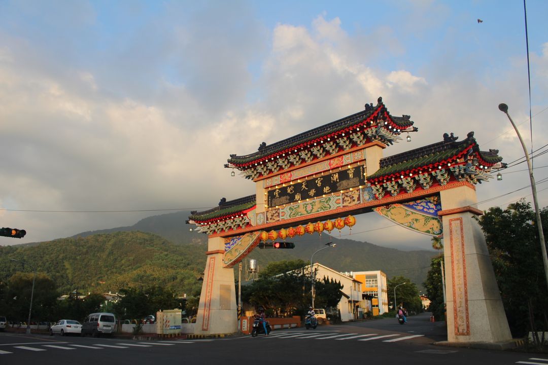 Traditional Chinese Gate in Serene Mountain Landscape at Sunset - Free Images, Stock Photos and Pictures on Pikwizard.com