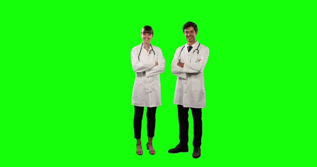 Doctors Standing Confidently with Stethoscopes on Green Background - Free Images, Stock Photos and Pictures on Pikwizard.com