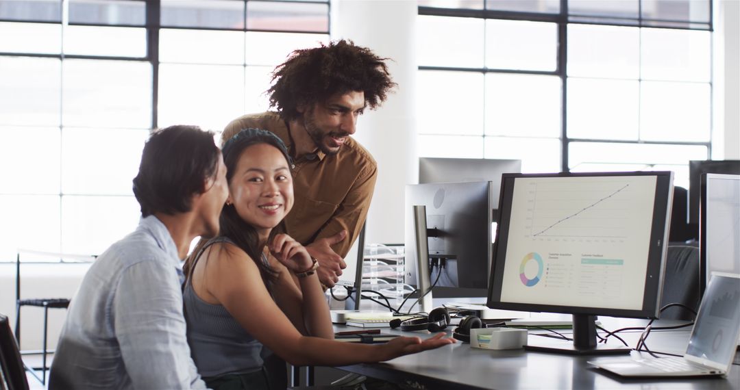 Diverse Team Discusses Analytics in Modern Office