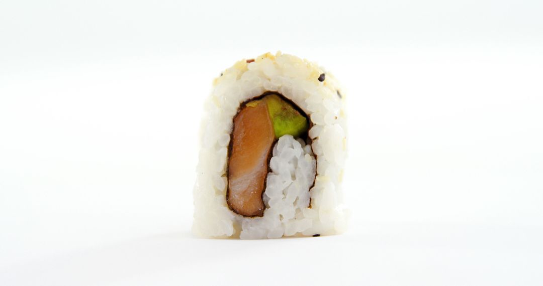 Close-Up Of Fresh Salmon Sushi Roll On White Background - Free Images, Stock Photos and Pictures on Pikwizard.com