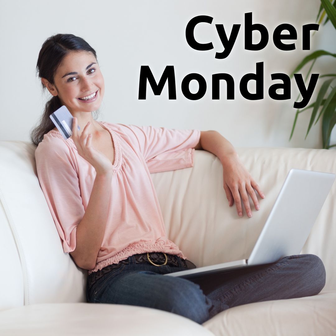 Joyful Woman Enjoying Cyber Monday Shopping on Sofa