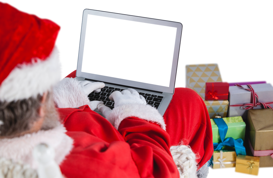 Transparent image of Santa Claus using laptop beside Christmas gift boxes - Download Free Stock Images Pikwizard.com