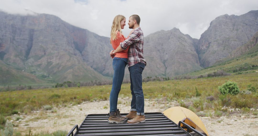 Couple Enjoying Camping Trip in Mountain Landscape - Free Images, Stock Photos and Pictures on Pikwizard.com