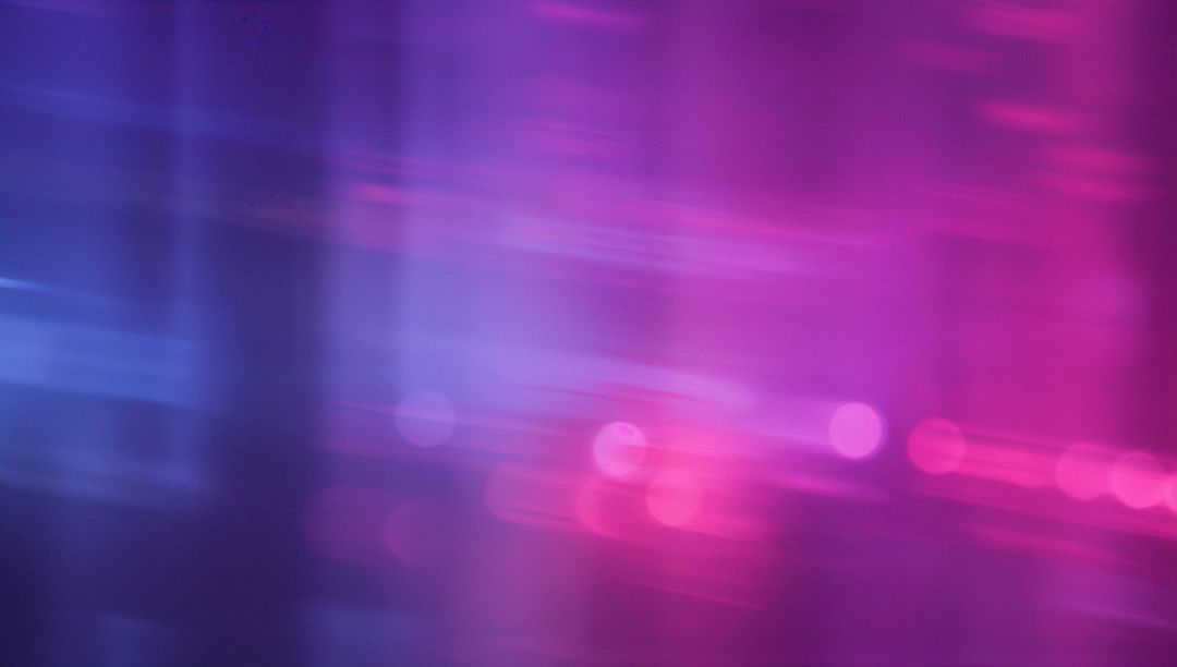 Abstract Blur of Violet and Pink Neon Streaks on Digital Canvas