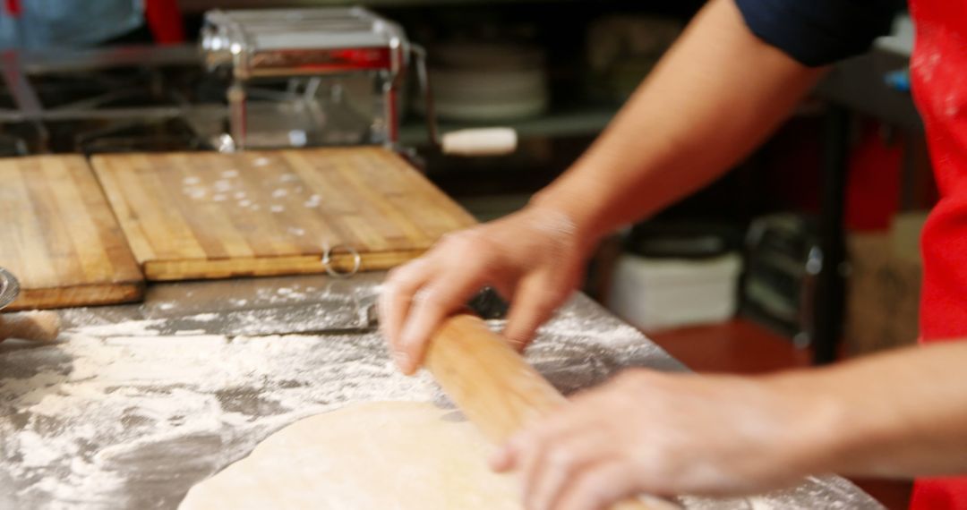 Person Rolling Dough in Kitchen Making Fresh Pasta - Free Images, Stock Photos and Pictures on Pikwizard.com