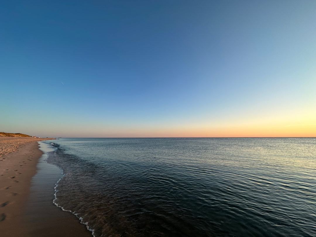 Serene beach horizon at sunset