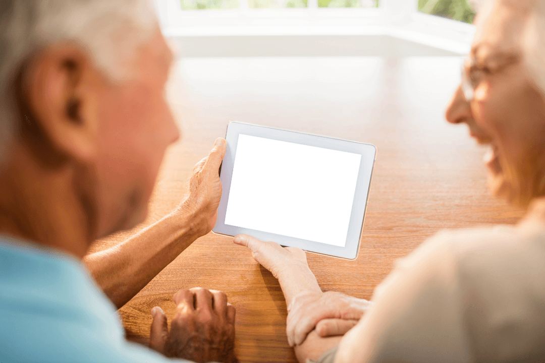 Senior Couple Browsing Real-Time Cosmology Model on Transparent Tablet