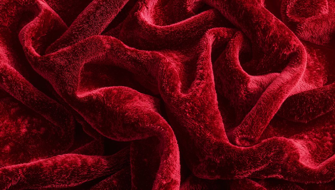 Plush Deep Red Velvet Fabric Shimmering Soft Pile with Luxurious Burgundy Folds